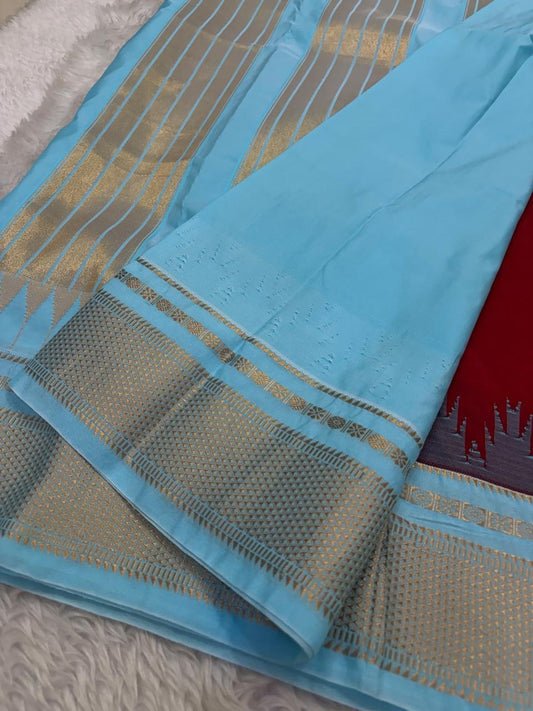 Deep red saree with powder blue and gold border in pure silk