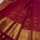 Close view of Zari Kattam body showing Gandaberunda Butta on deep rose red Kanchipuram silk