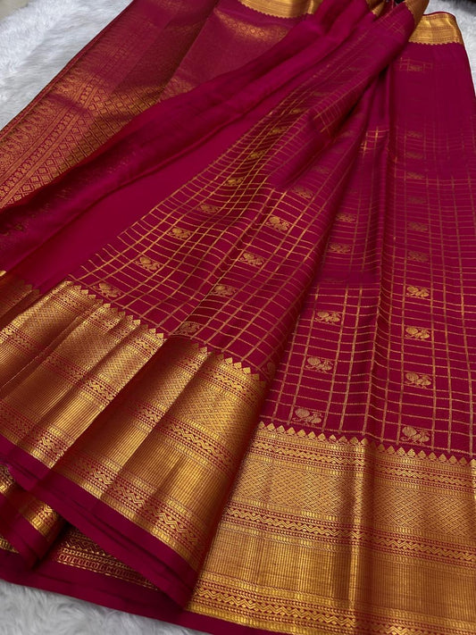 Close view of Zari Kattam body showing Gandaberunda Butta on deep rose red Kanchipuram silk
