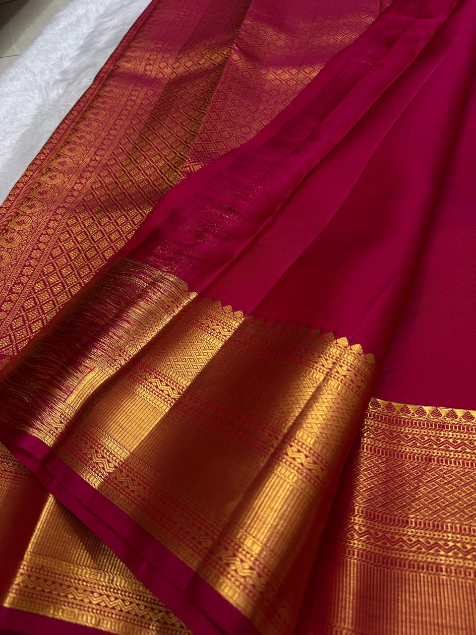 Thick Varisaipet gold zari border on deep rose red Kanchipuram saree
