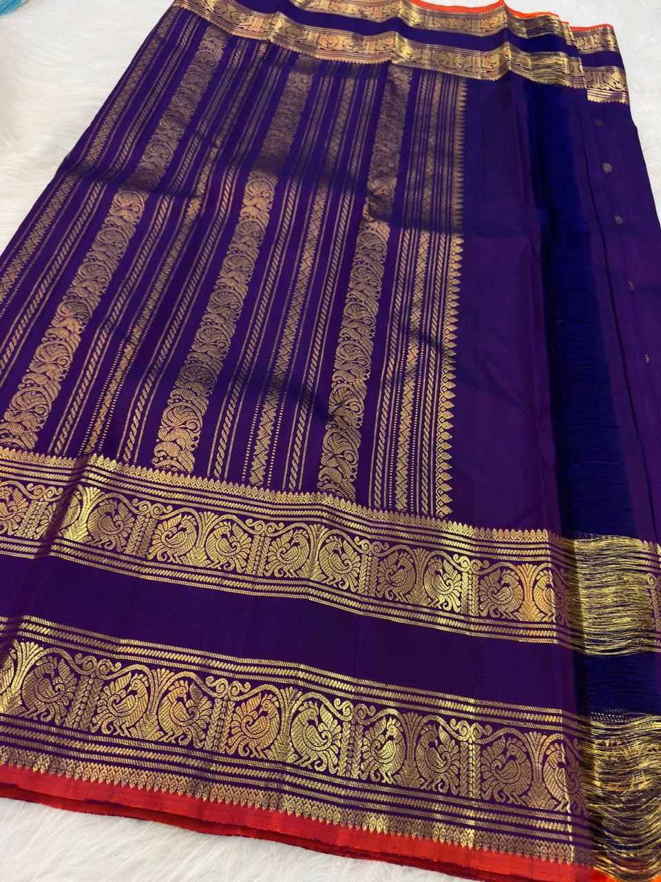 Deep Royal Violet Handwoven Pure Silk Kanchipuram Saree with Rettapet Mayil Zari Border and Orange-Red Selvedge