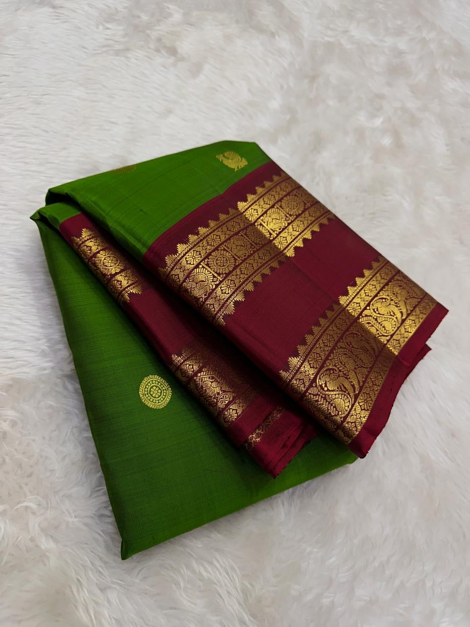 Deep ruby rettapet border on bright green Kanjivaram silk saree USA Idam Living