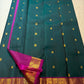 Rani Pink contrast border with broad traditional gold zari.