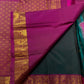 Figurative gold-zari detailing against saturated Pink silk.