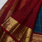 Petite traditional gold zari buttas positioned within the checked Peacock Teal Kanchipuram body.