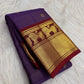 Folded Deep Violet Vaira silk showing fine metallic lines and lined-up Yazhi motifs across the gold zari border.
