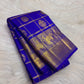Deep Violet Kanchipuram silk saree with Gandaberunda zari motifs, draped to show the pallu and border detail.