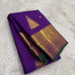 Handwoven Kanchipuram silk saree in jewel-toned violet with intricate zari motifs