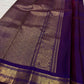 Close view of petite gold zari buttas across Deep Violet Purple pure mulberry silk saree.