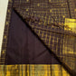 Close-up of chedi butta in gold zari on deep violet plum Kanchipuram silk saree — Idam Living