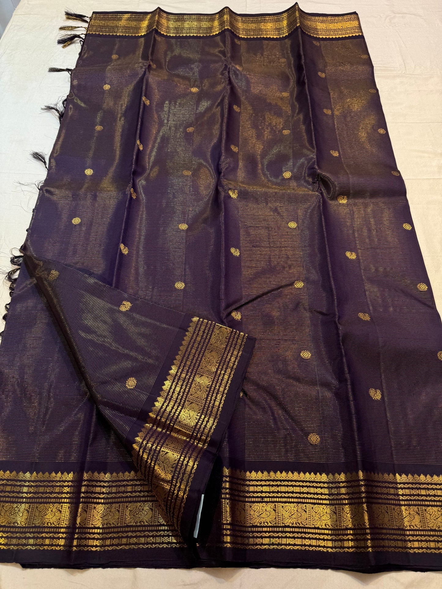 Deepest Black Kanchipuram Saree — gold zari peacock border with geometric detailing