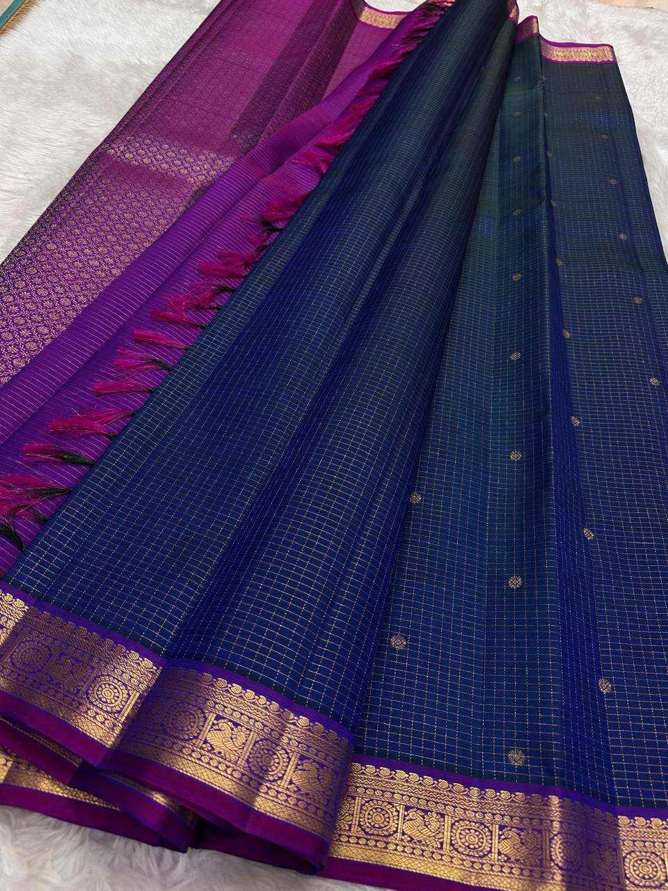 Elegant blue Kanjeevaram saree with antique gold zari kattam pattern