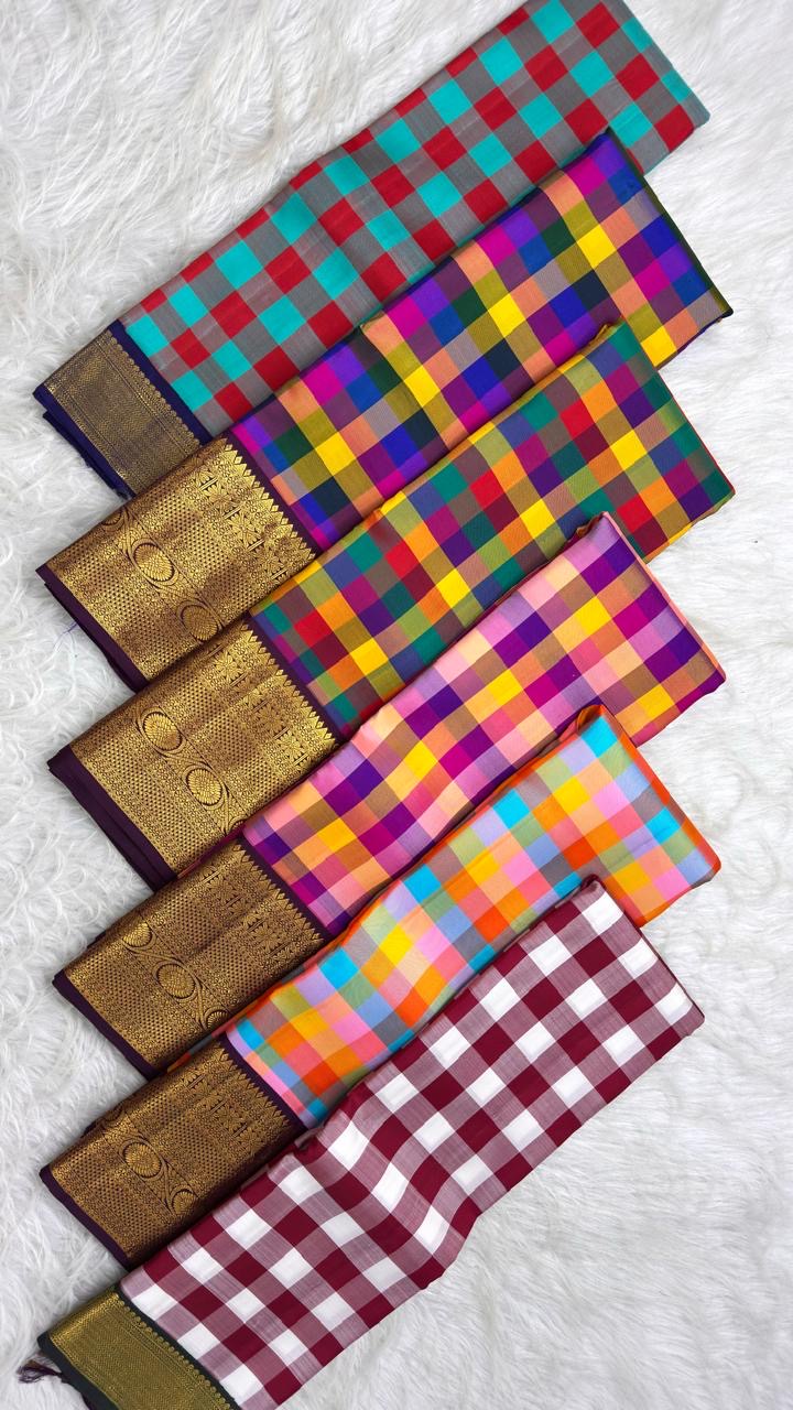 Aubergine pallu with rich gold patterned panels and scrollwork | Kancheepuram pure silk saree.