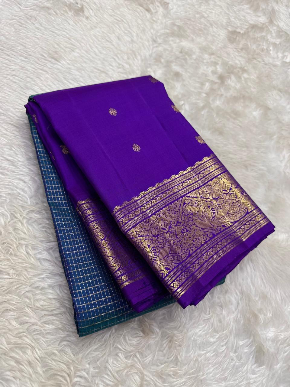 Kanchipattu silk saree in sapphire blue with orchid purple border Double Korvai weave traditional zari detail