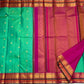 Emerald Aqua Green Shot-Colour Handwoven Pure Silk Kanchi Pattu Korvai Saree with Gold Zari Buttas and Raspberry Pink Pallu