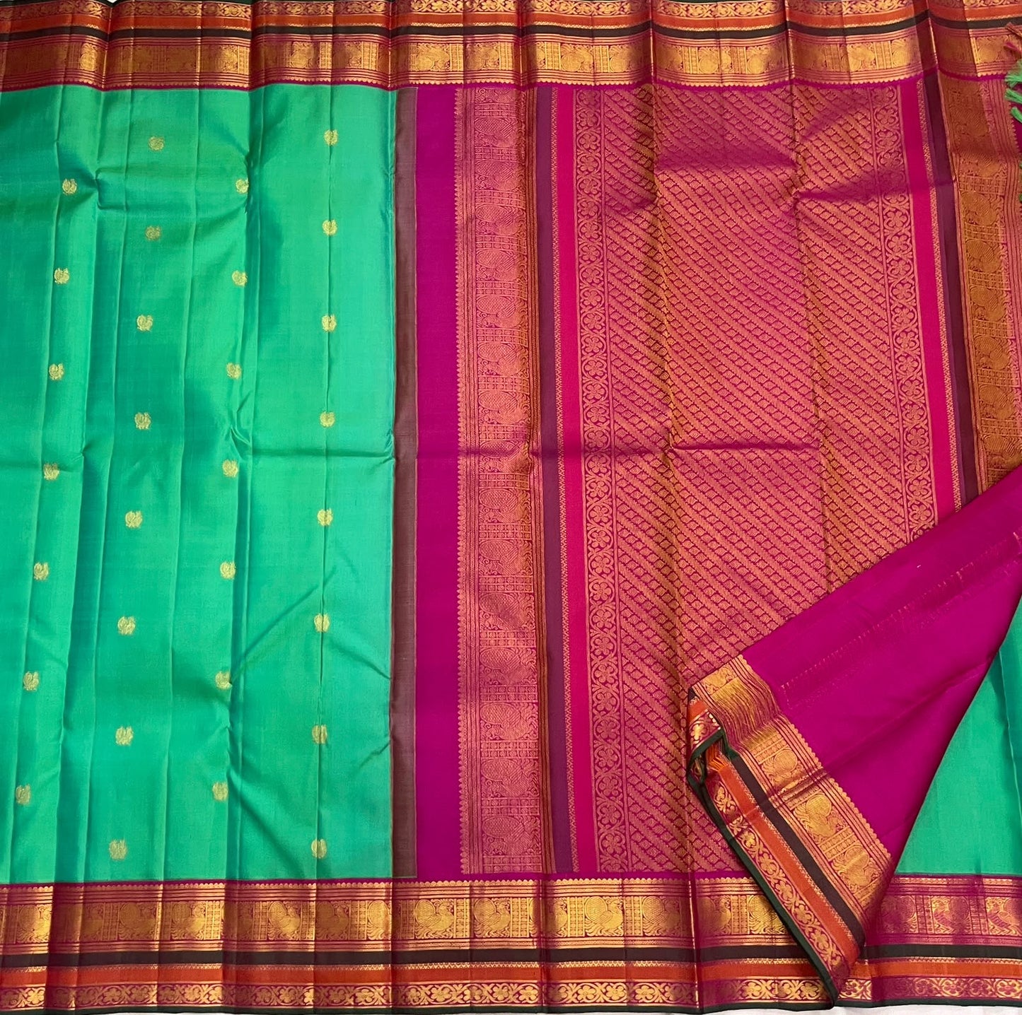 Emerald Aqua Green Shot-Colour Handwoven Pure Silk Kanchi Pattu Korvai Saree with Gold Zari Buttas and Raspberry Pink Pallu