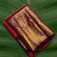 Kanchipuram silk saree in double shade tomato red with hot pink plum purple border border Korvai weave folded view