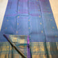 Turquoise blue yali-motif border on Twilight Periwinkle Kanjivaram silk saree