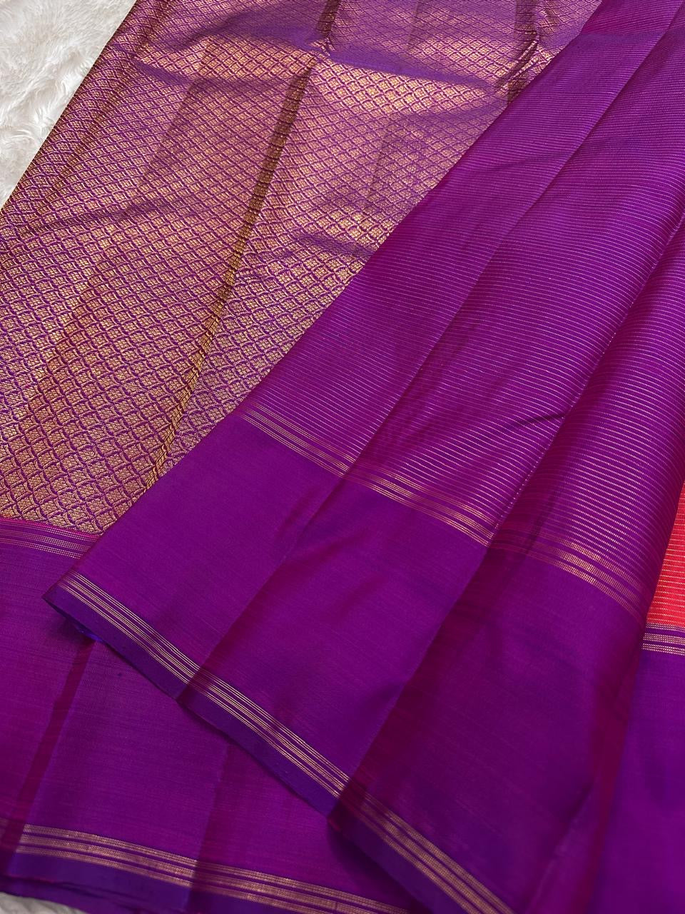deep purple border with thin zari lines on pure kanchipuram silk saree