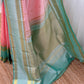 full length drape of pink and sea green kanchipuram silk saree on mannequin