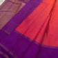 coral red pink silk body with fine checked texture and purple border pure kanchipuram silk saree