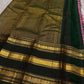 December Poo Mauve saree with deep Karum Pachai bottle-green border detail