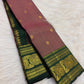 Dusty Mauve Kanchipuram Zari Kattam saree — forest green elephant medallion border close-up