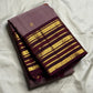 Close-up of silk thread butta in orange and gold on dusty brown-purple mauve Kanchipuram silk saree — Idam Living
