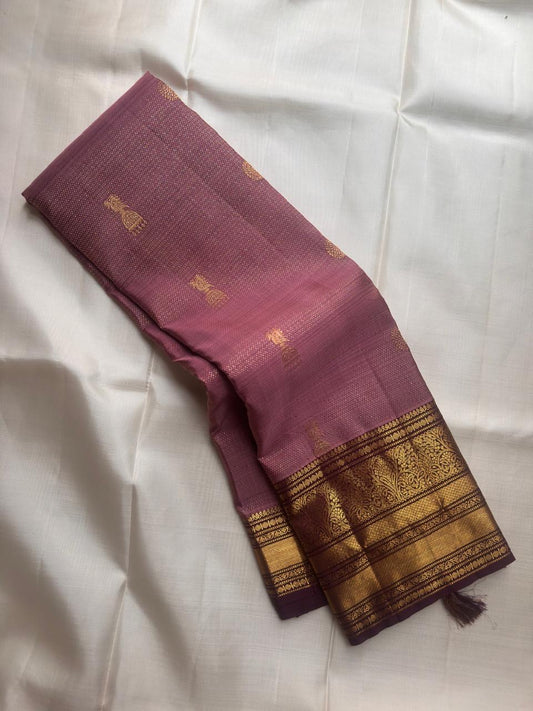 Dusty Mauve-Lilac Pure Silk Kanchipuram saree with Kathiripoo purple border.