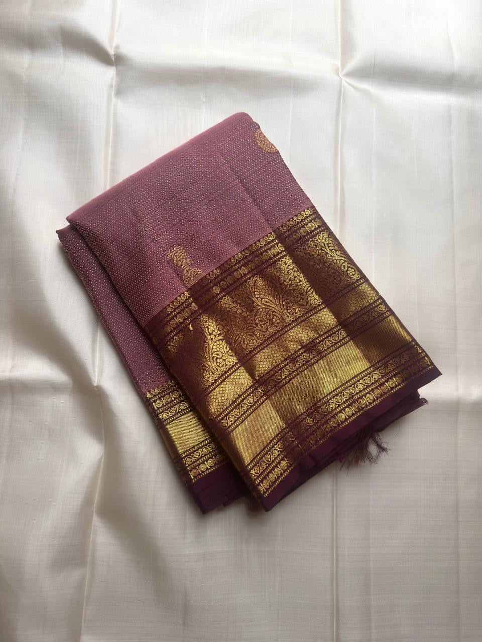 Dusty Mauve-Lilac Kanchipuram Zari Kattam saree with Kathiripoo purple gold-zari border.