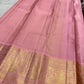 Dusty Rose Pink and gold Korvai border on a handwoven Deep Aubergine Brown Kanchi Pattu saree.
