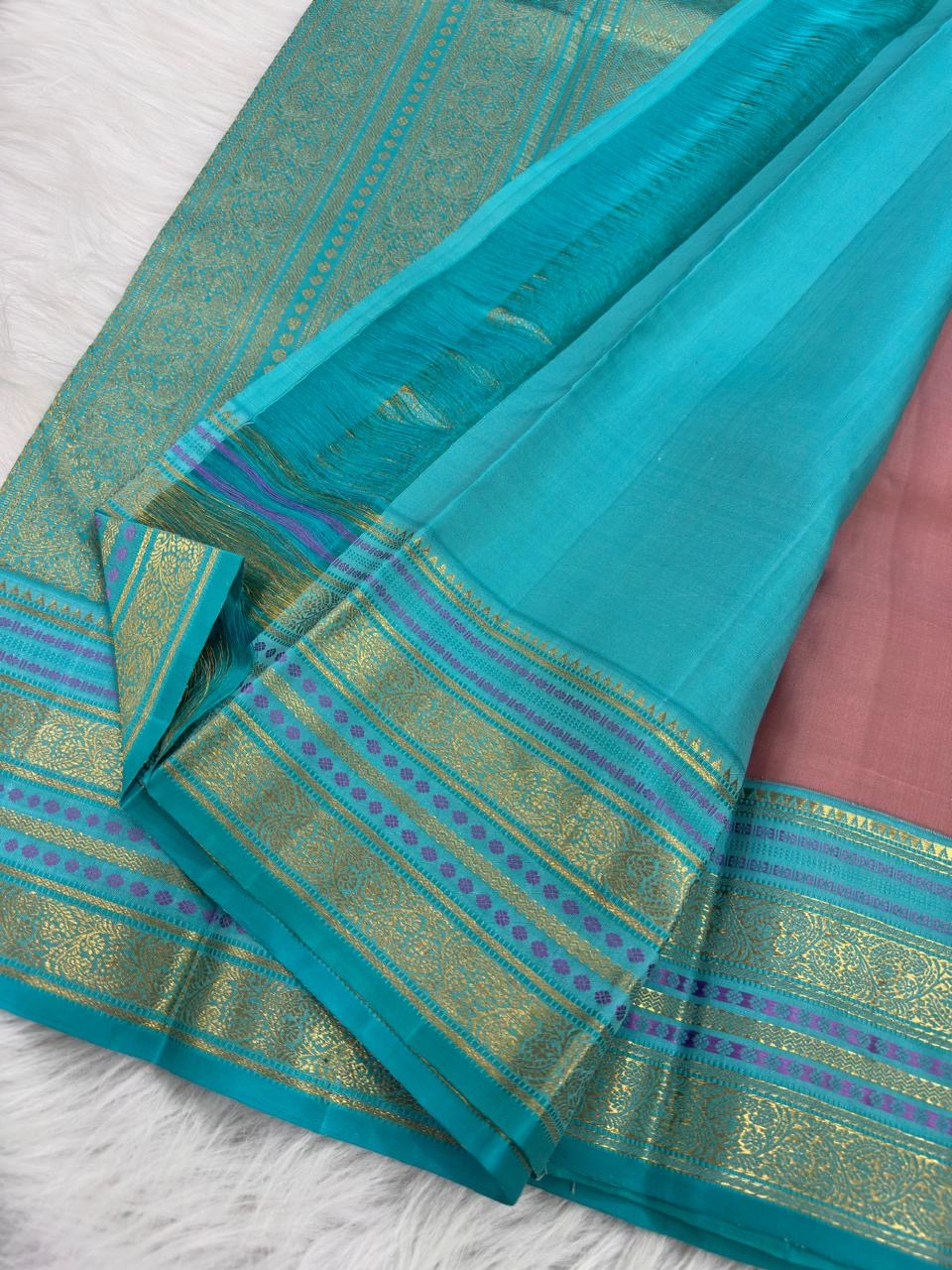 Detail of gold zari butta motif on Dusty Rose Kanjipuram Varisaipet silk saree body