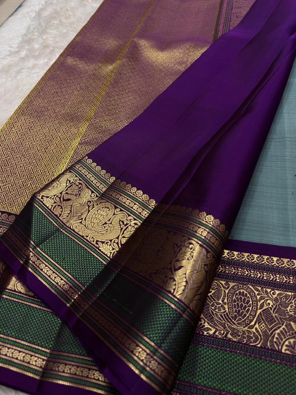 Vintage Sky Blue and Purple Handwoven Pure Silk KanchiPattu Saree with Floral Butta and Zari Border