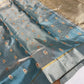 Dusty Steel Blue Tissue Pattu Silk Chanderi saree with gold and red motifs, silver border and geometric metallic pallu