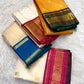 Warm ivory Vairaoosi pure silk Kanchipuram saree – ivory body and Arakku red border draped together