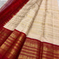 Warm ivory Vairaoosi pure silk Kanchipuram saree – Arakku red border and pallu zari detail