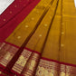 Kanchipattu silk saree in korvai with earthy mustard yellow border weave traditional zari detail