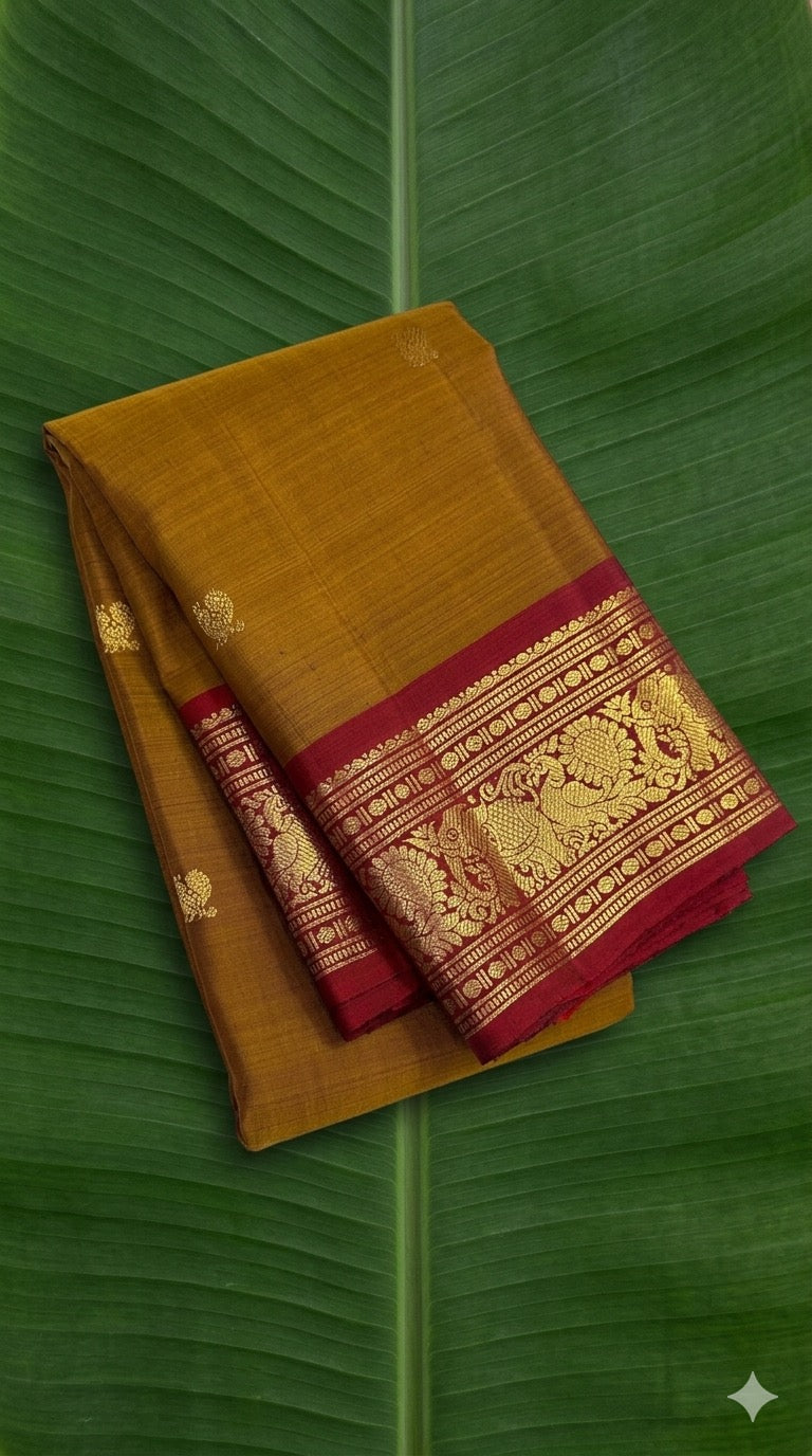 Kanchipuram silk saree in korvai with earthy mustard yellow border weave folded view