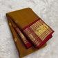 Kanchipattu silk saree in korvai with earthy mustard yellow border weave traditional zari detail
