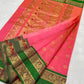 Close view of Coral Pink handloom Chanderi saree with small gold buttas and ornamental woven border