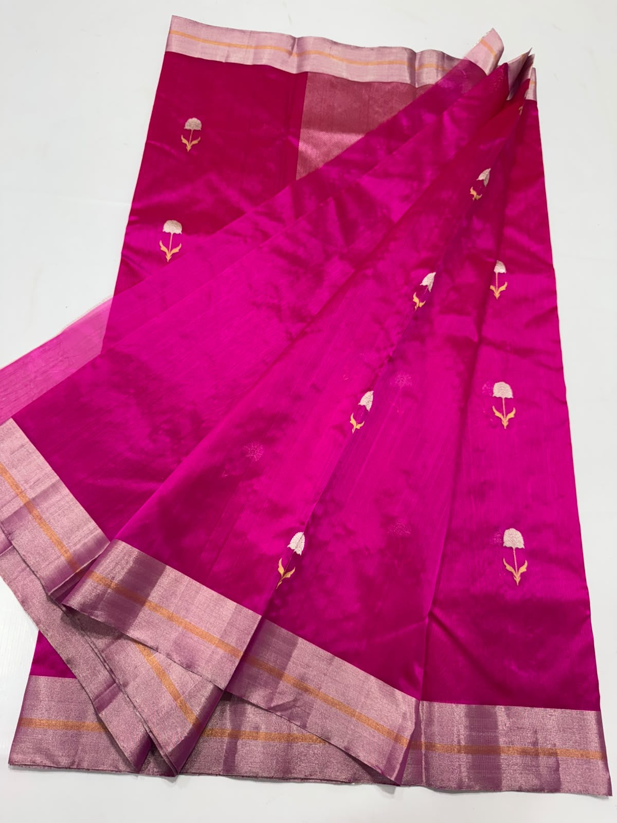 Handwoven Rani Pink Chanderi saree with floral butti