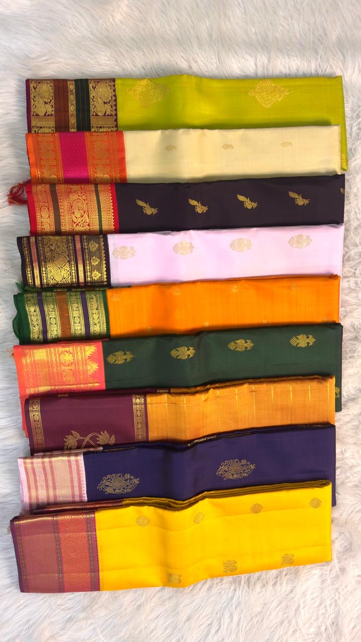 Elam pachai Kanchipuram silk saree with korvai orange border and purple selvedge.