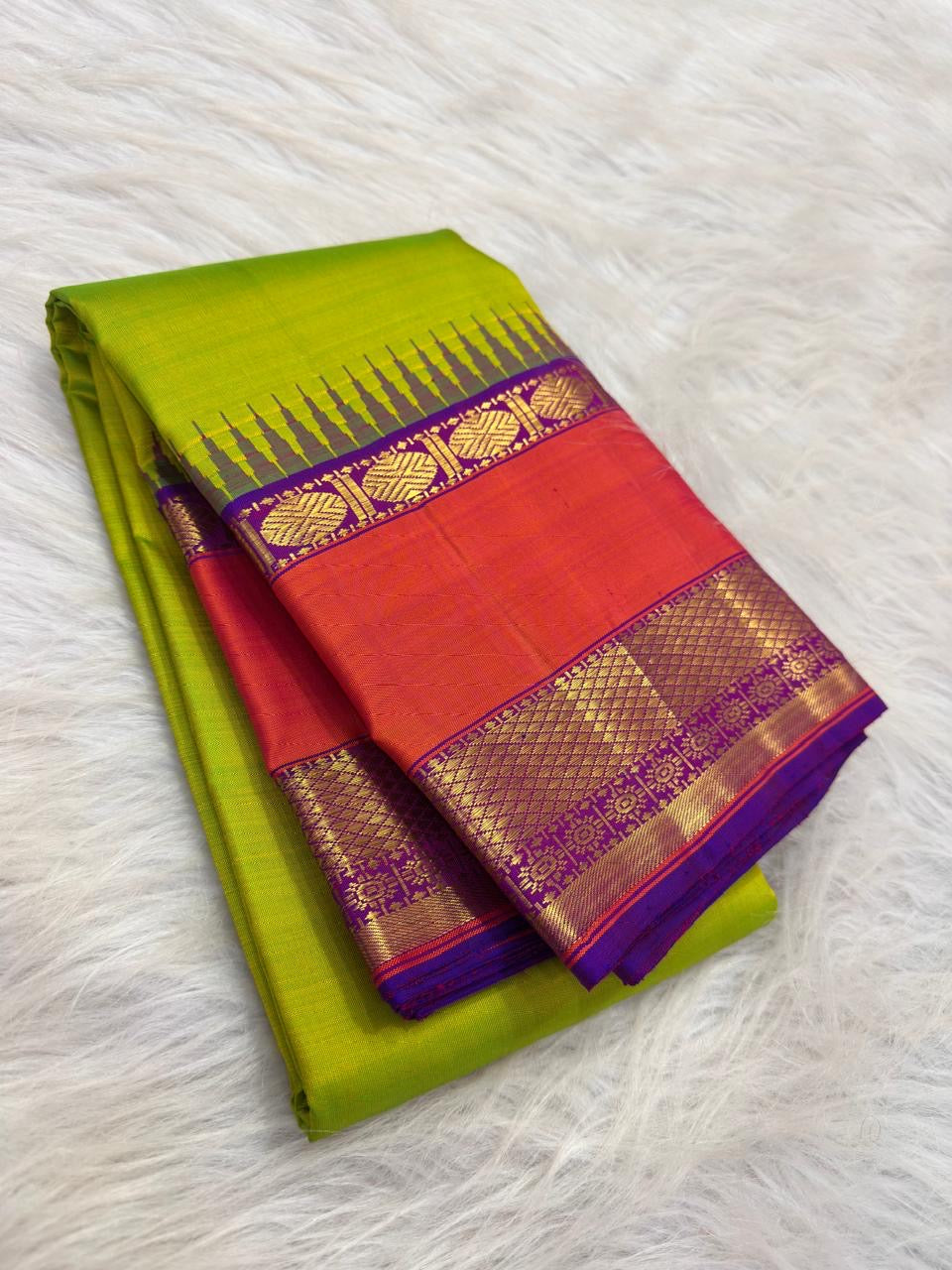 Elam pachai Pure Silk Kanchipuram varisaipet saree with korvai orange border.