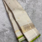 Pure Kanjivaram silk saree in soft ivory with traditional zari pallu