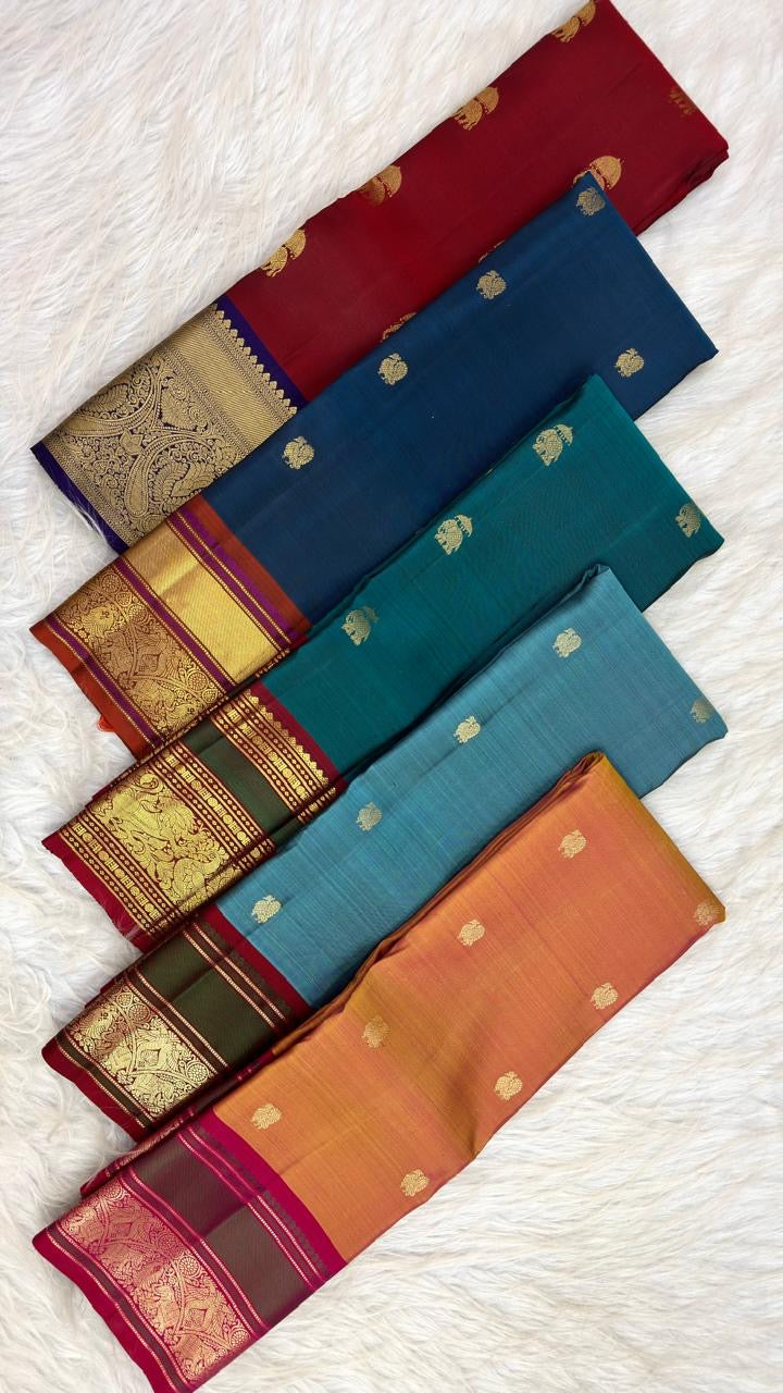 Mambazham Manjal Kanchipuram silk saree with Vadamalli magenta and deep olive-green contrast