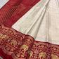 Handwoven elephant motifs within ornate zari border on Kancheepuram saree