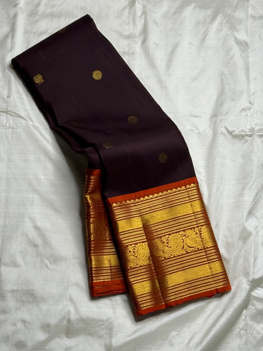 Pure Kanjivaram silk saree with Mayil Chakram butta and traditional gold zari
