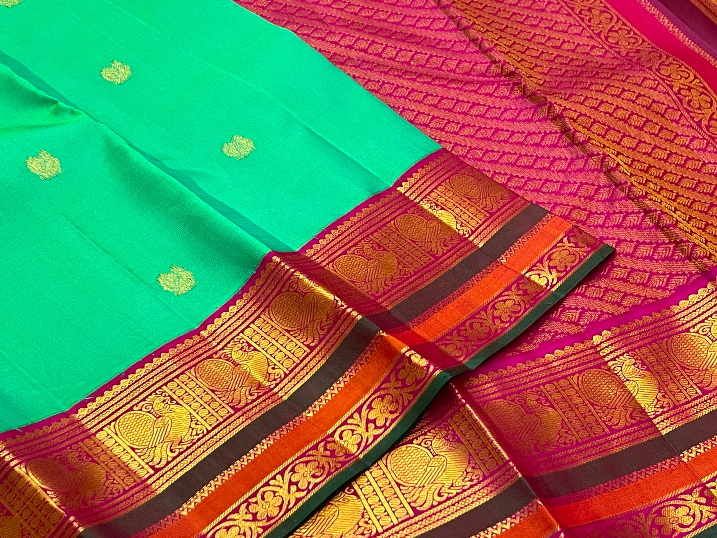 Emerald Aqua Green Shot-Colour Handwoven Pure Silk Kanchi Pattu Korvai Saree with Gold Zari Buttas and Raspberry Pink Pallu