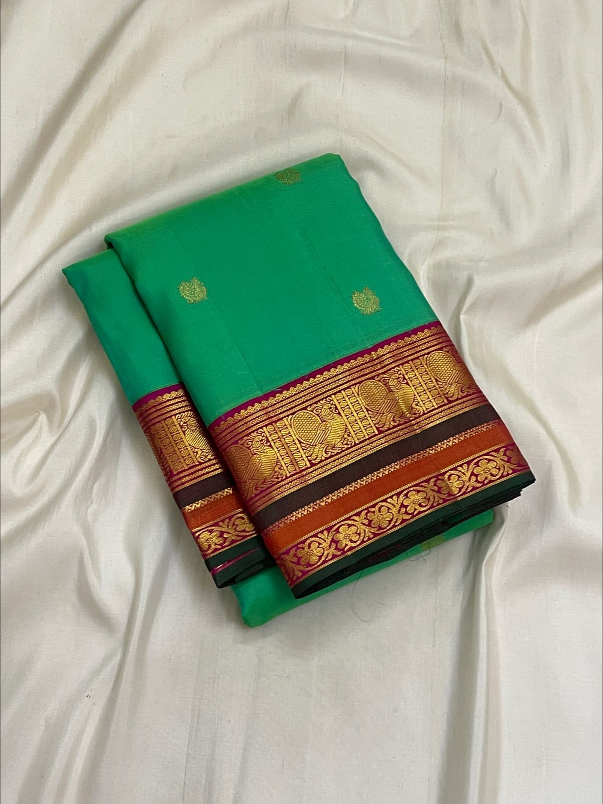 Emerald Aqua Green Shot-Colour Handwoven Pure Silk Kanchi Pattu Korvai Saree with Gold Zari Buttas and Raspberry Pink Pallu