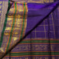 Royal Purple pure silk Kanchipuram saree — emerald green border
